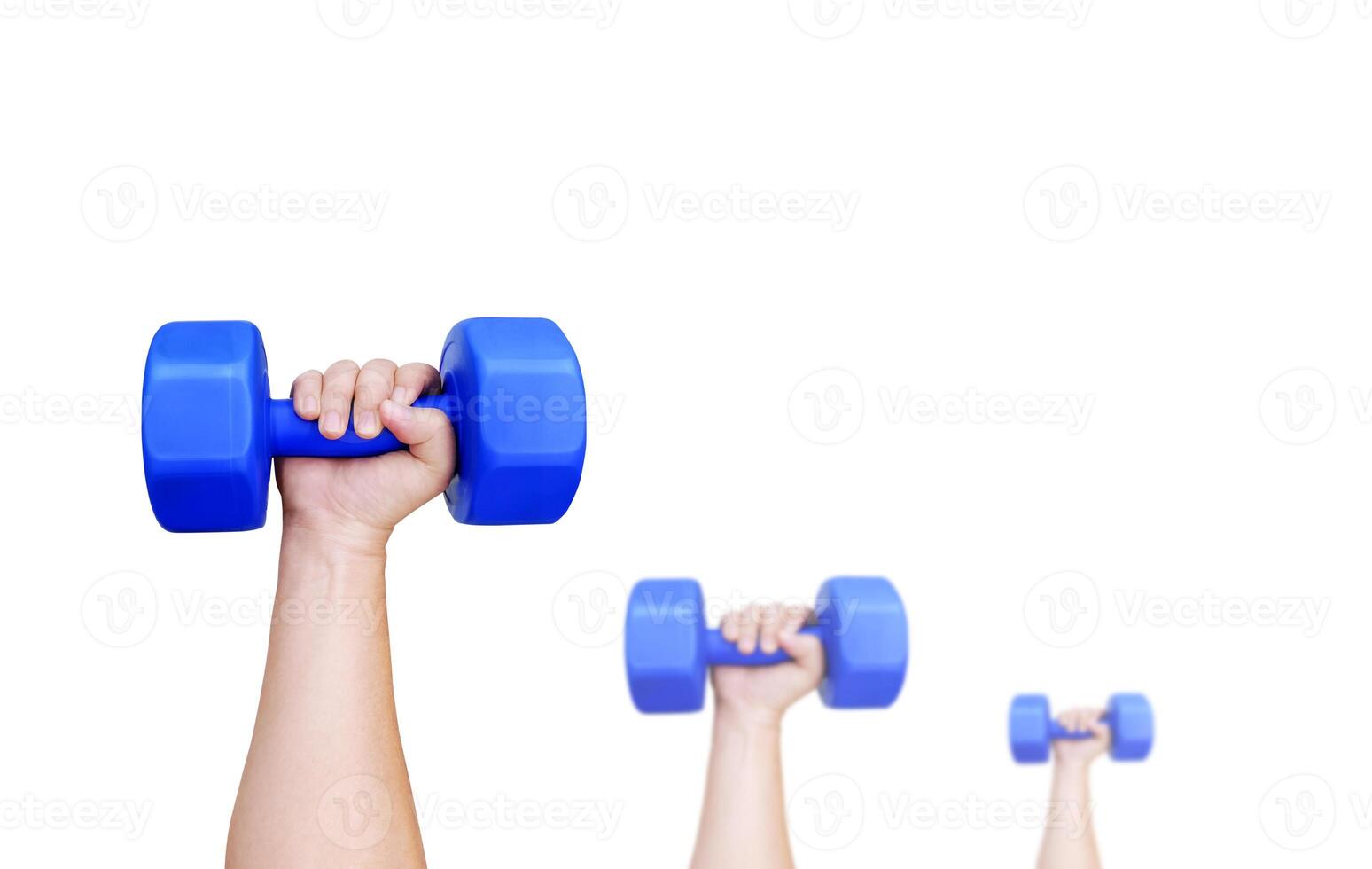 Man's hand holding a blue dumbbell. photo