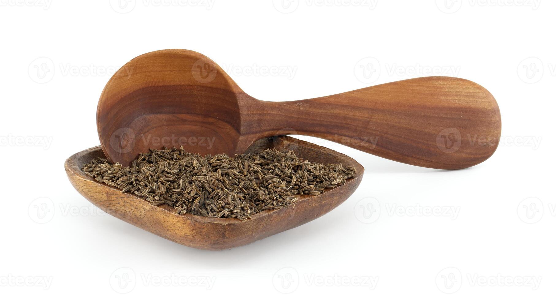 Wooden Spoon and Bowl with Caraway Seeds Displaying Natural Texture photo