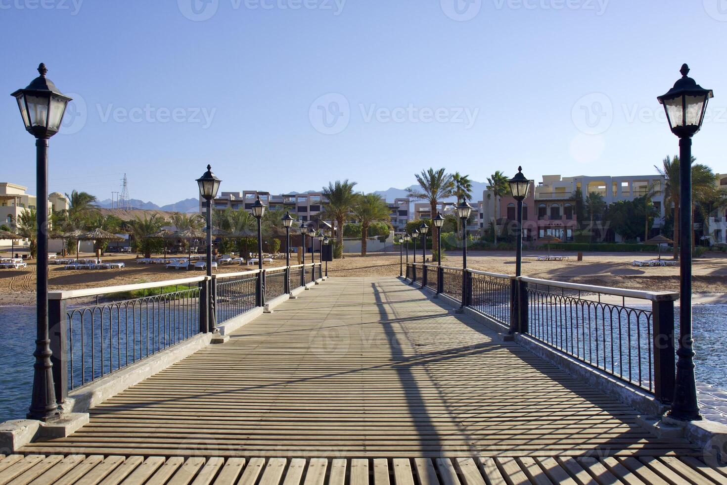 Relax on the beach with umbrellas and sun loungers photo