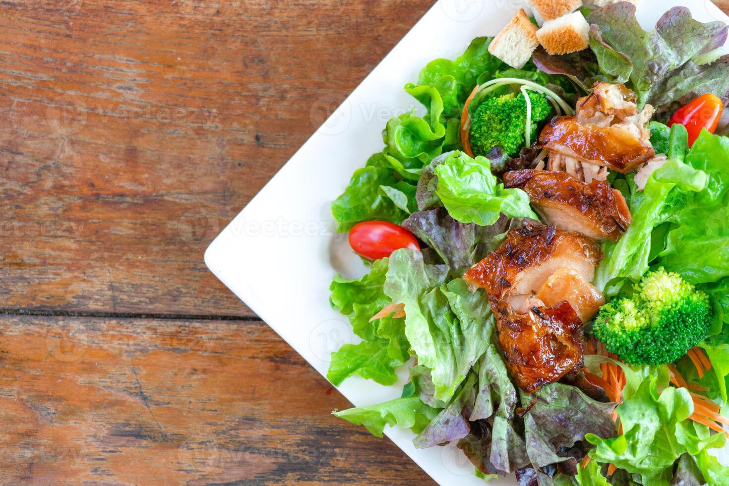 Grilled chicken salad with vegetables photo