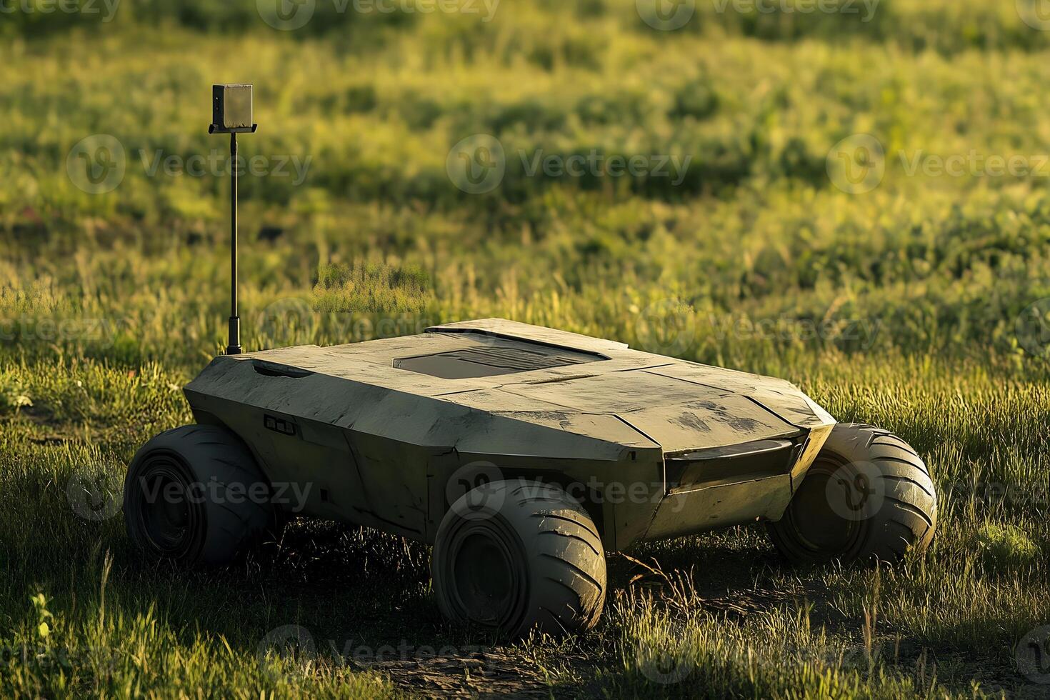 Military ground based drone on grassland during daylight. photo