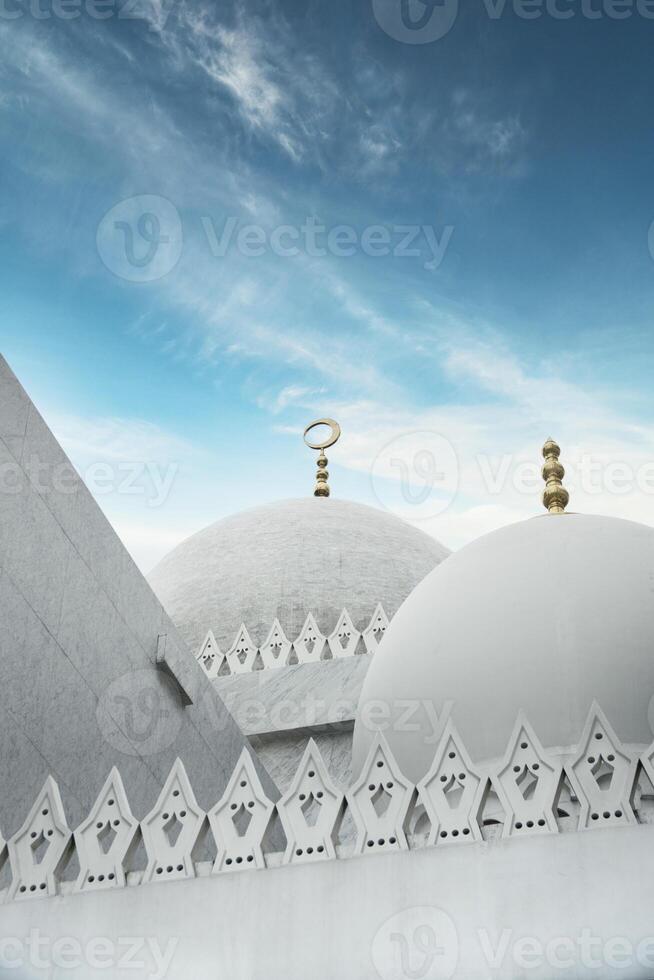 Majestic Elegant Sheikh Zayed Grand Mosque Dome of a Marble Building Against a Vibrant Sky photo
