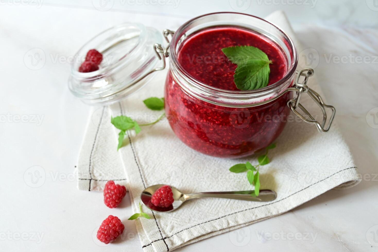 A Simple and Elegant Presentation of Raspberries with Spoons photo