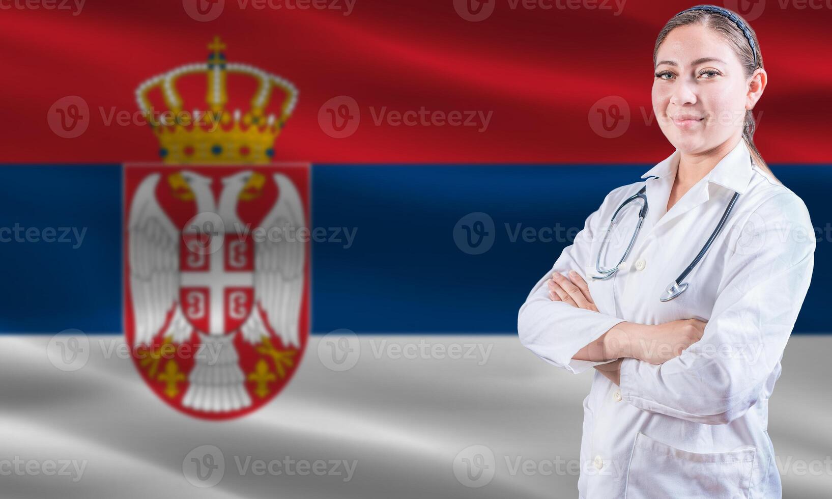 Female doctor on Serbia flag. Doctor with crossed arms on Serbia flag. Serbia Health and Care concept photo