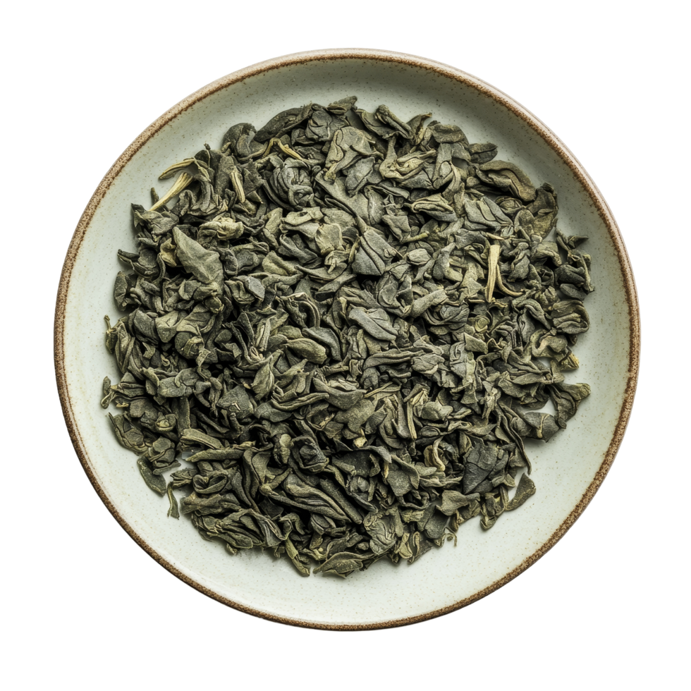 Dry green tea leaves arranged neatly on a plate against a clean transparent background highlighting their texture and color, dry green tea in plate on transparent background png
