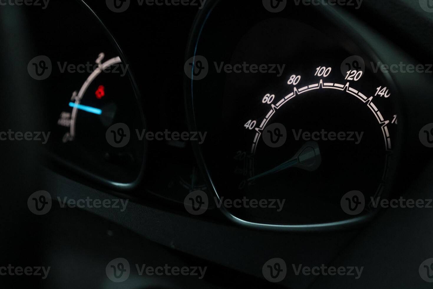 Close up shot of a speedometer in a car. At an engine speed of 1800 rpm photo