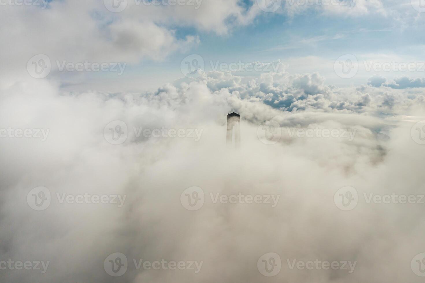 Aerial view of the top of the pylons of the Russian bridge in clouds photo