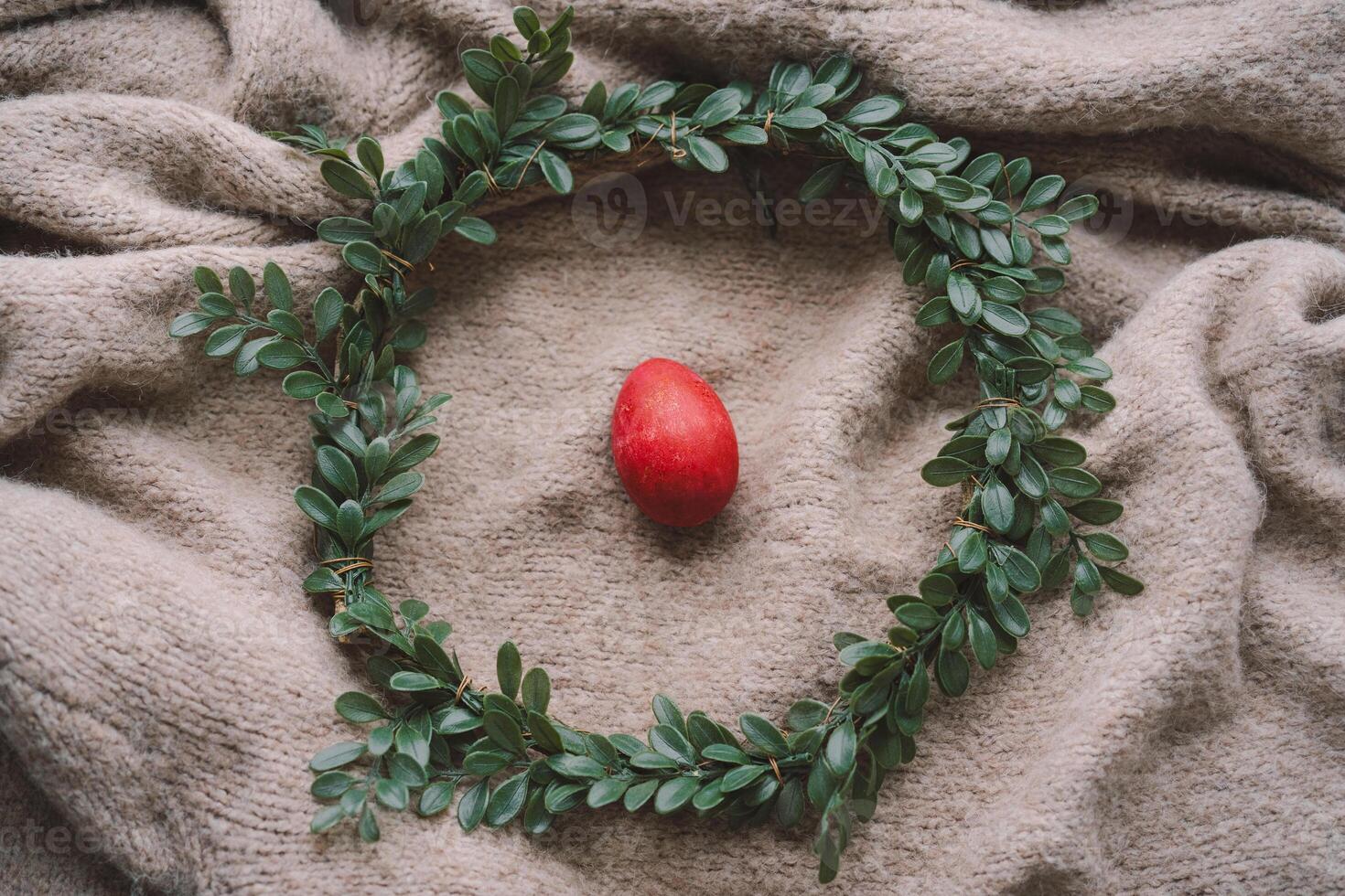 Easter decoration featuring colorful eggs arranged in a cozy nest photo