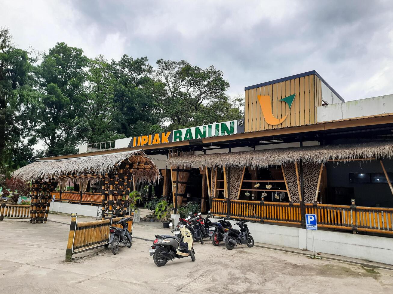 Padang Pariaman, Indonesia - Jan 12, 2025. Upiak Banun food court in Kayutanam, a popular stopover offering traditional and modern dishes. it serves dine-in and takeaway food for travelers photo