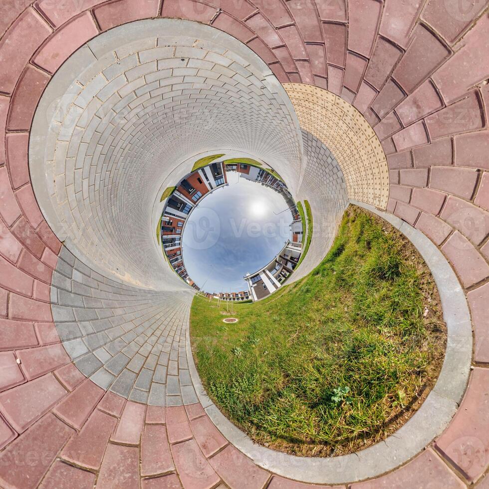 blue sphere inside overlooking old town, urban development, historic buildings surrounded by a frame of paving slabs. Transformation of spherical 360 panorama photo