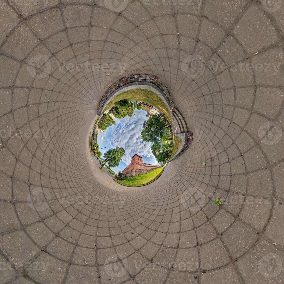 blue sphere inside overlookingtown, urban development, historic buildings surrounded by a frame of paving slabs. Transformation of spherical 360 panorama in abstract aerial view. photo
