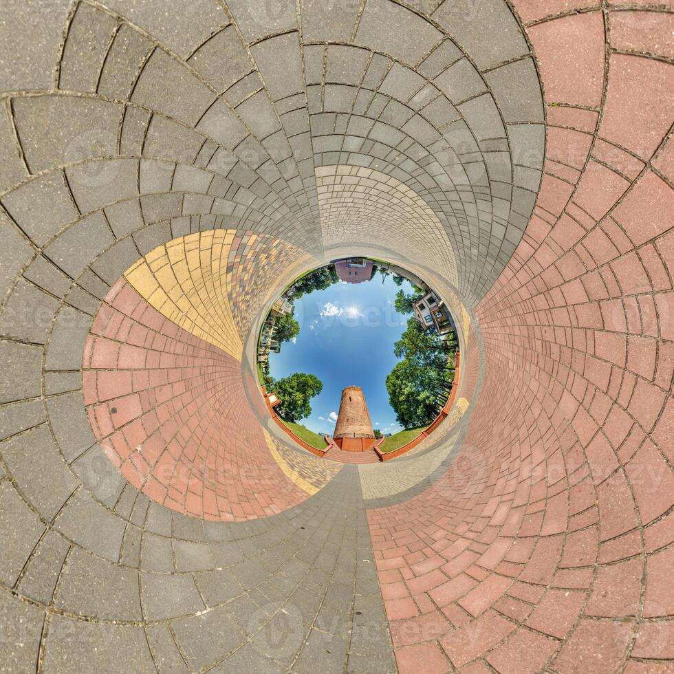 blue sphere inside overlooking town, development, historic buildings surrounded by a frame of paving slabs. Transformation of spherical 360 panorama in abstract aerial view. photo