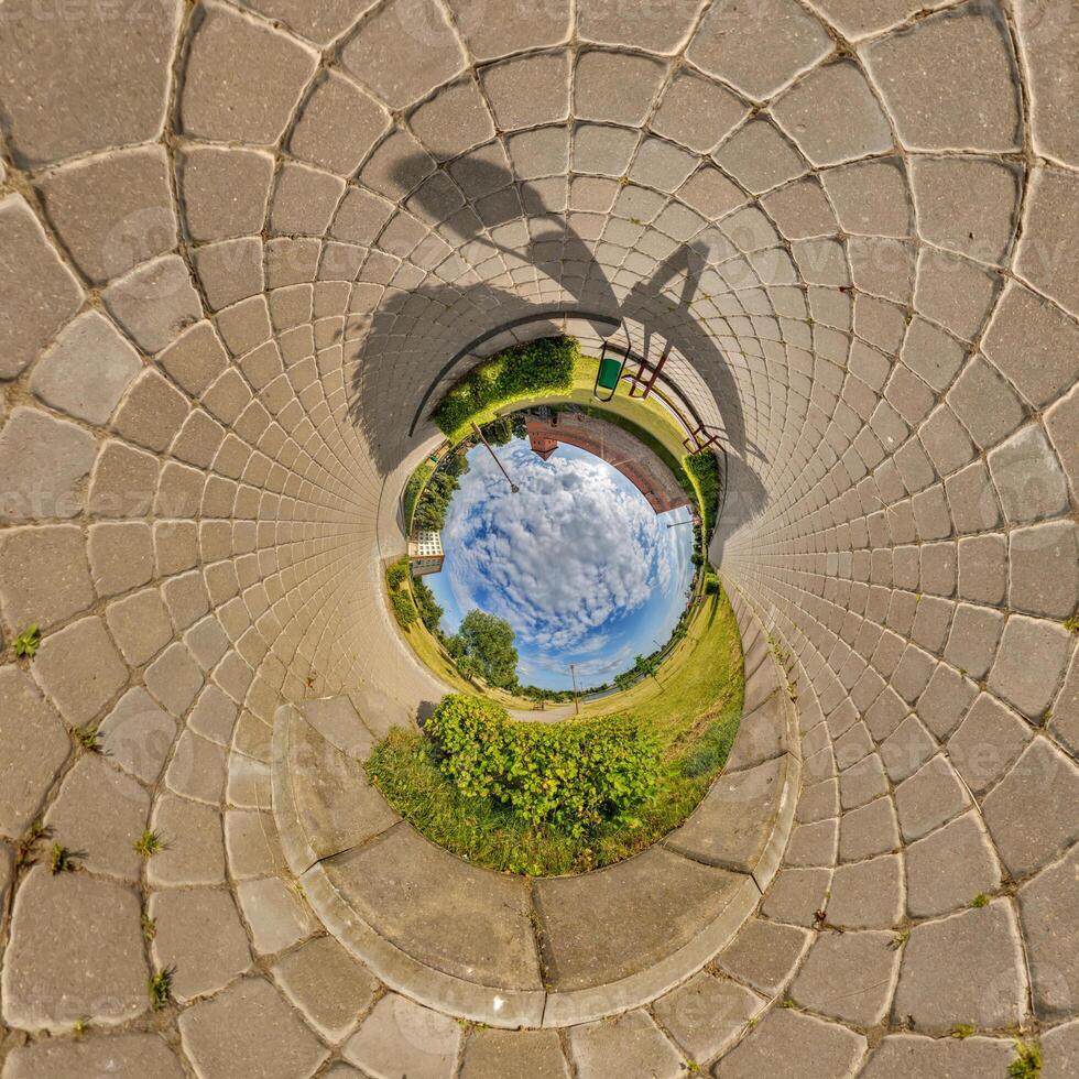 blue inside overlooking old town, urban development, historic buildings surrounded by a frame of paving slabs. Transformation of spherical 360 panorama in abstract aerial view. photo