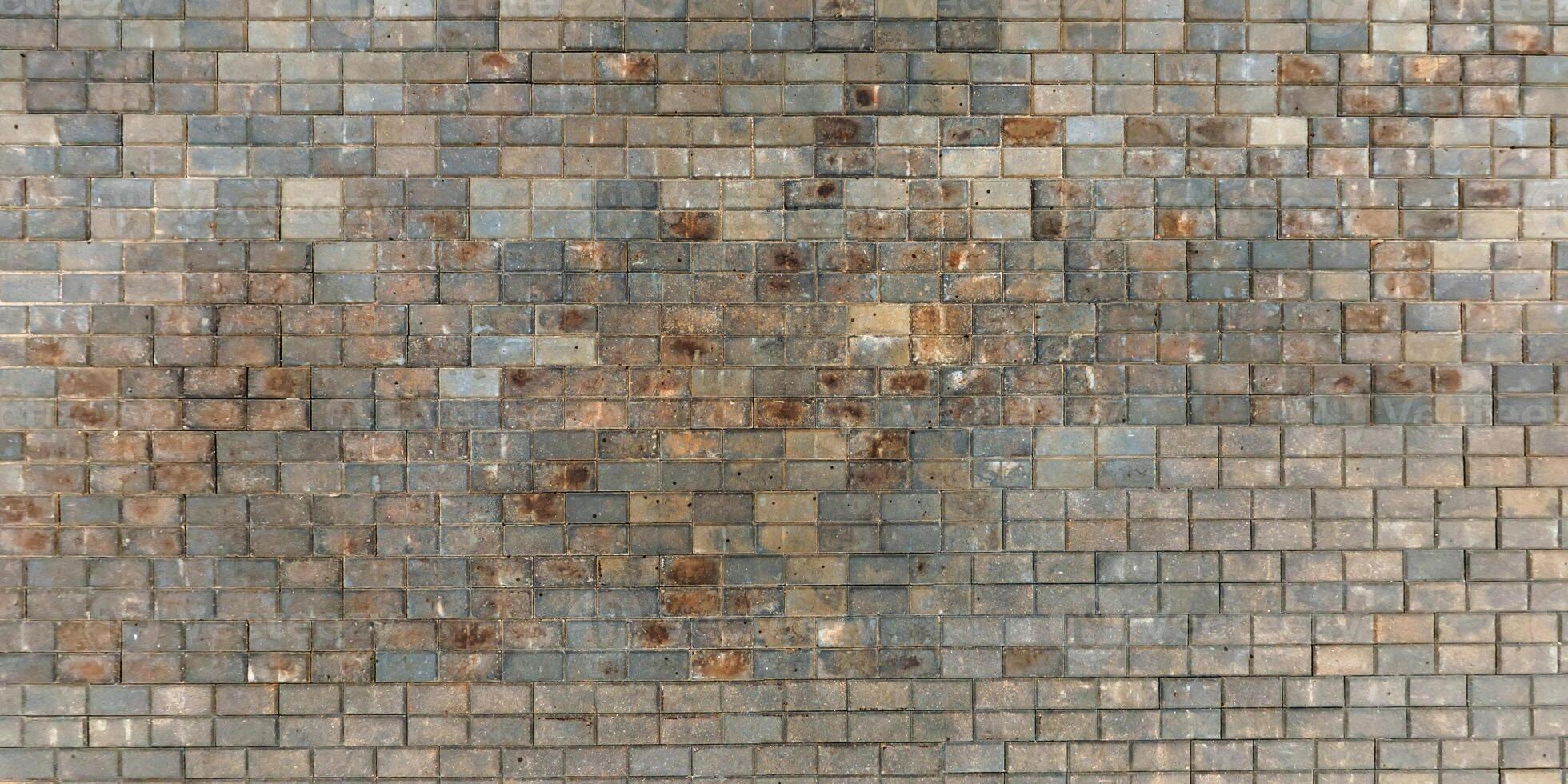 top view of the surface of a pedestrian path with paving slabs photo