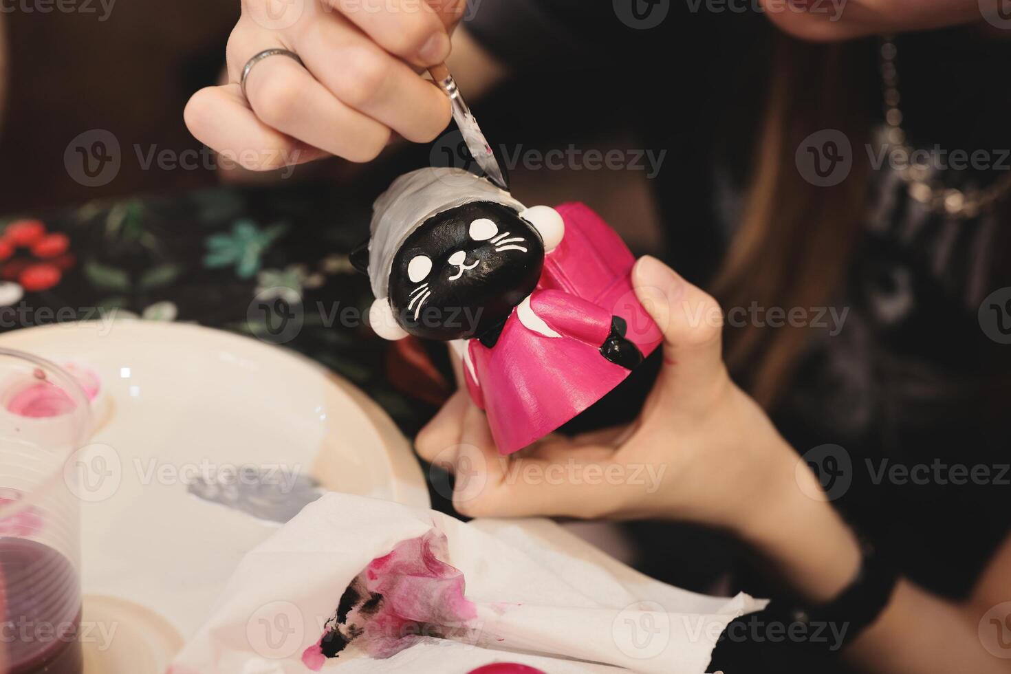 Join us for an engaging and creative painting session that features whimsical figurine designs photo