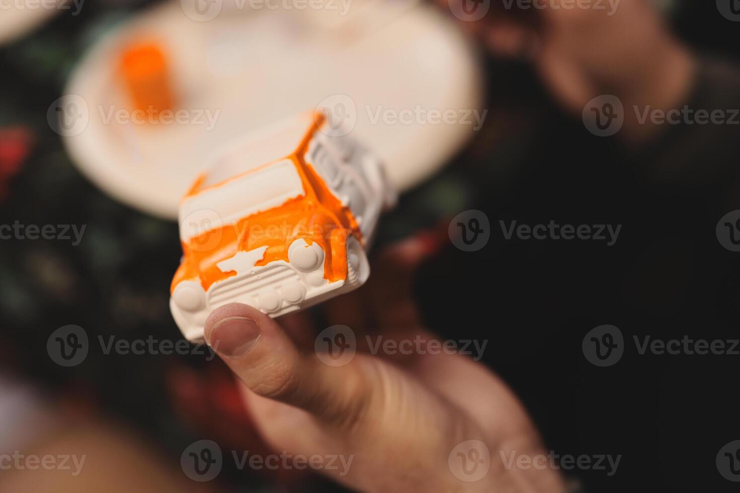 A beautifully handpainted toy car that is expertly crafted with vibrant, eyecatching colors photo