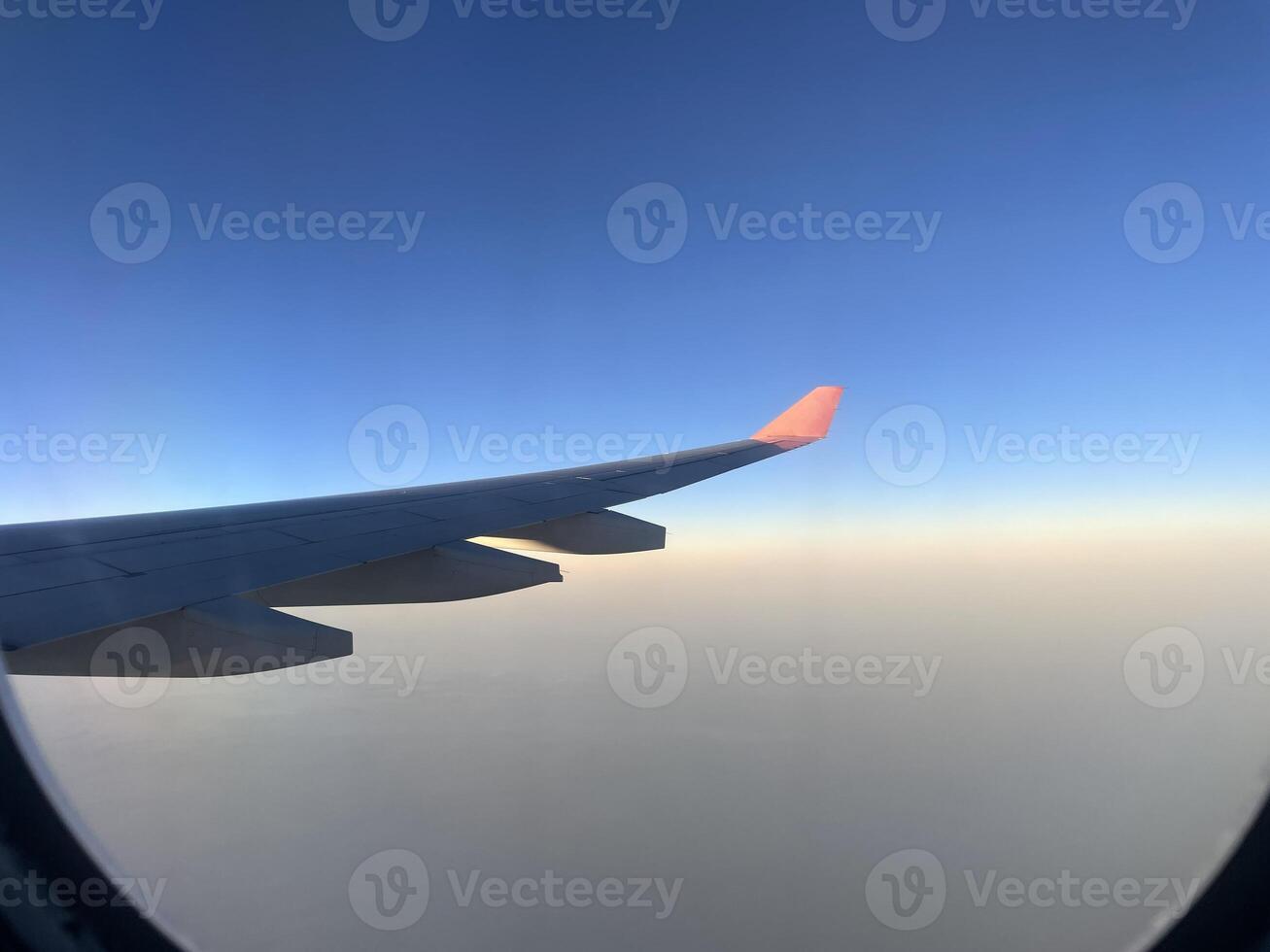 A beautiful aerial view seen from an airplane window during an exciting flight journey photo