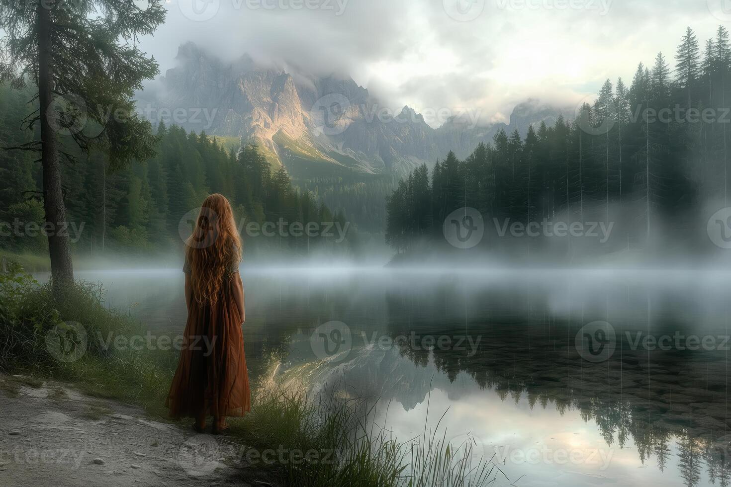 woman with backpack standing by a calm mountain lake 3 photo