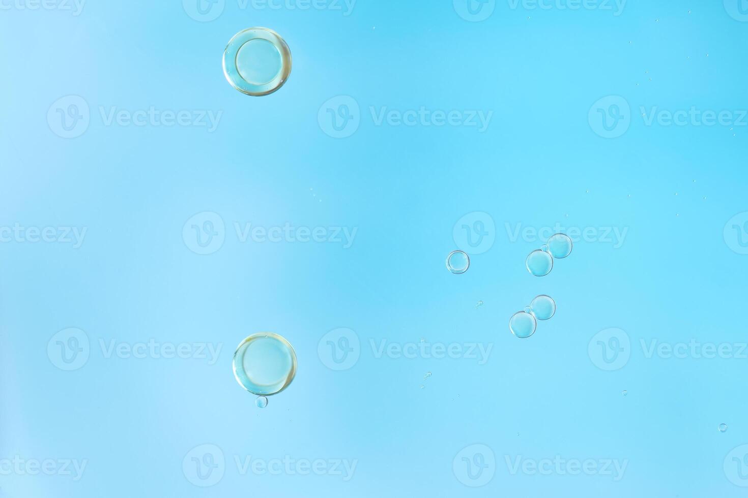 Abstract Bubbles Cluster on Aqua Blue Background photo
