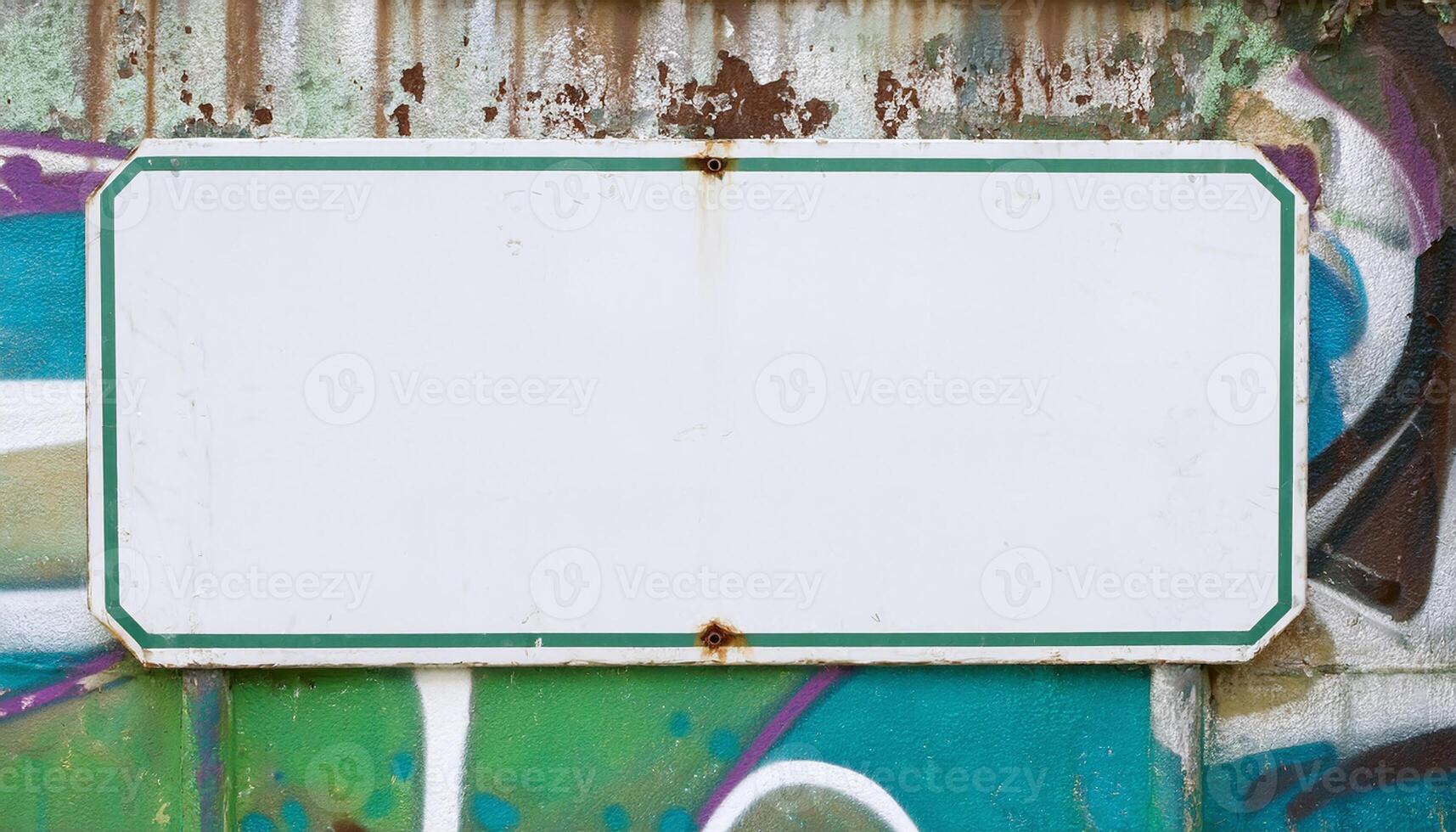 Metall Sign on Graffiti Wall photo
