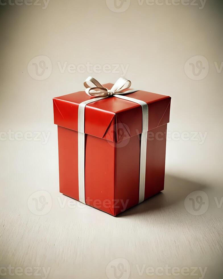 Fancy red gift box with a white ribbon photo