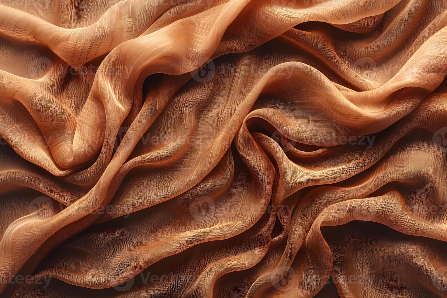Soft fabric drapes emphasizing texture and movement with warm hues contrasting against a neutral background photo
