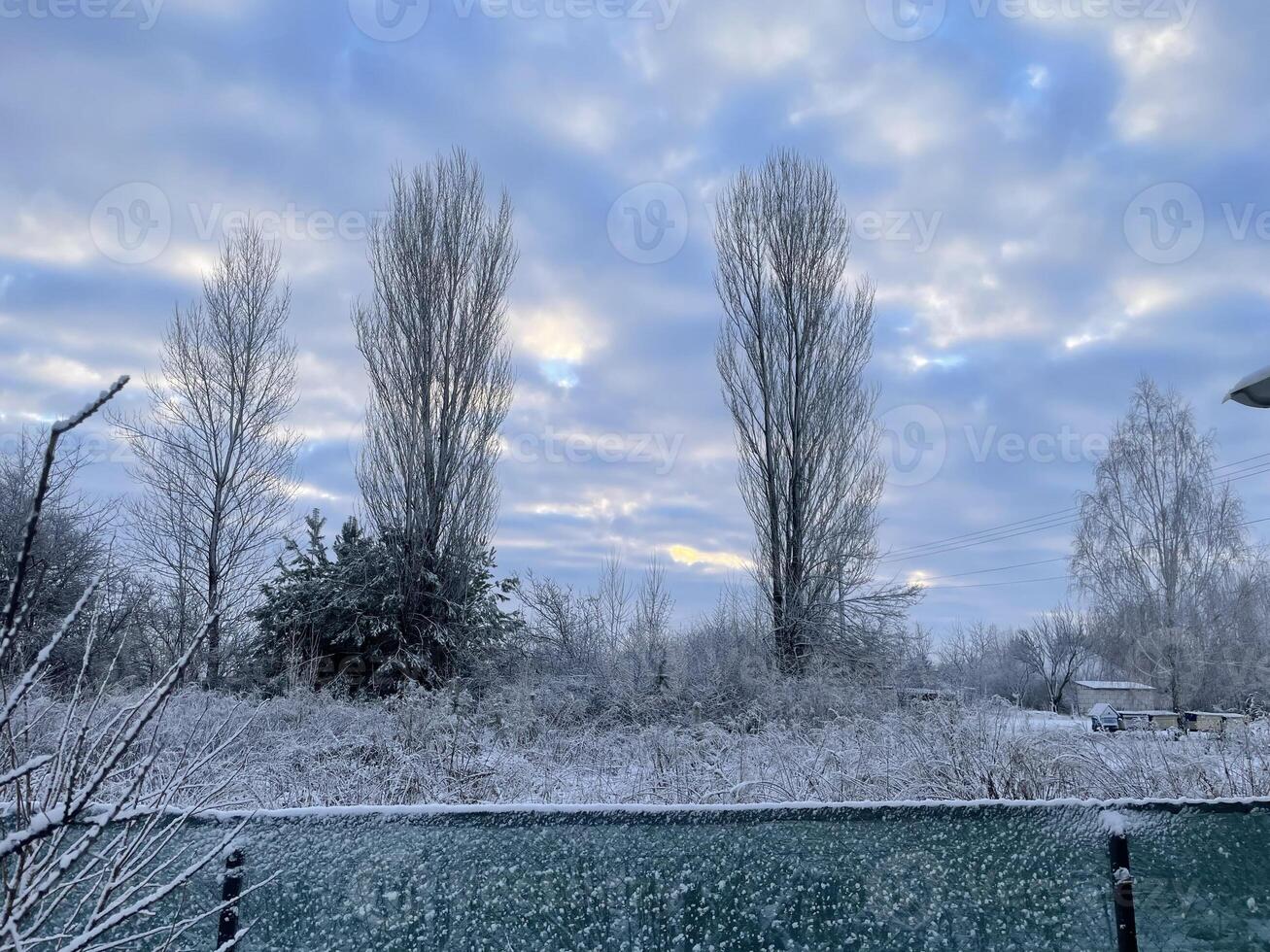 Winter sky in the village with soft pastel hues 53 photo