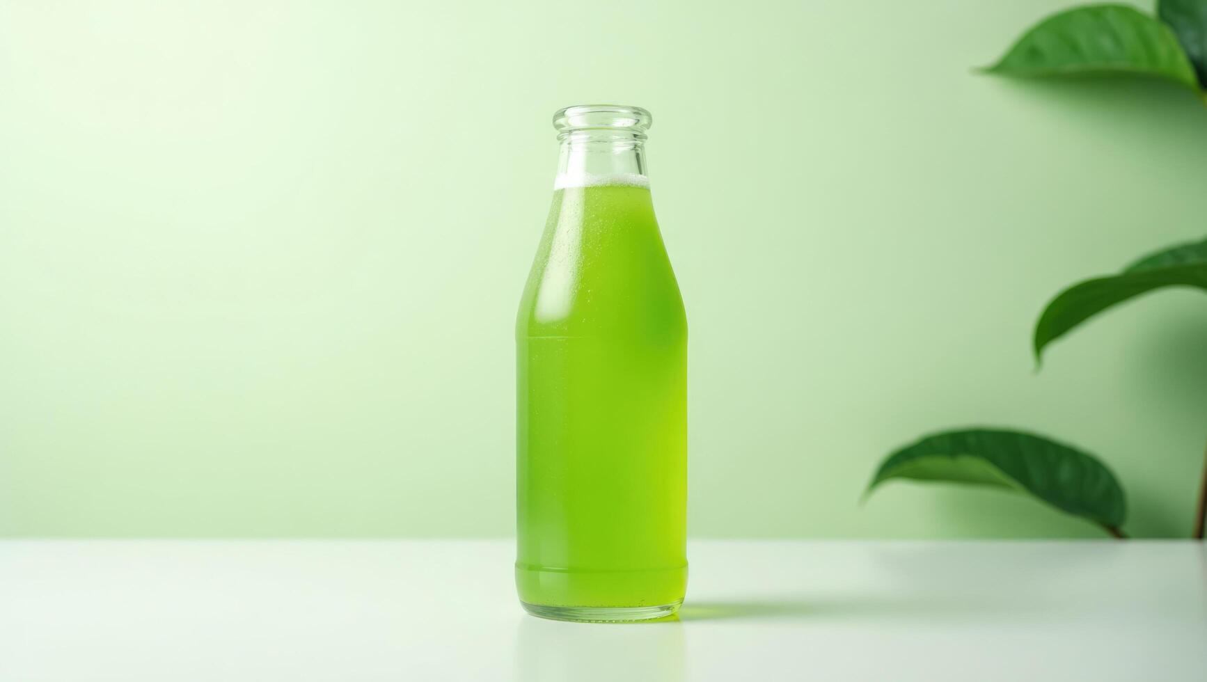 Organic Green Juice in Transparent Glass Bottle for Healthy Refreshment. photo