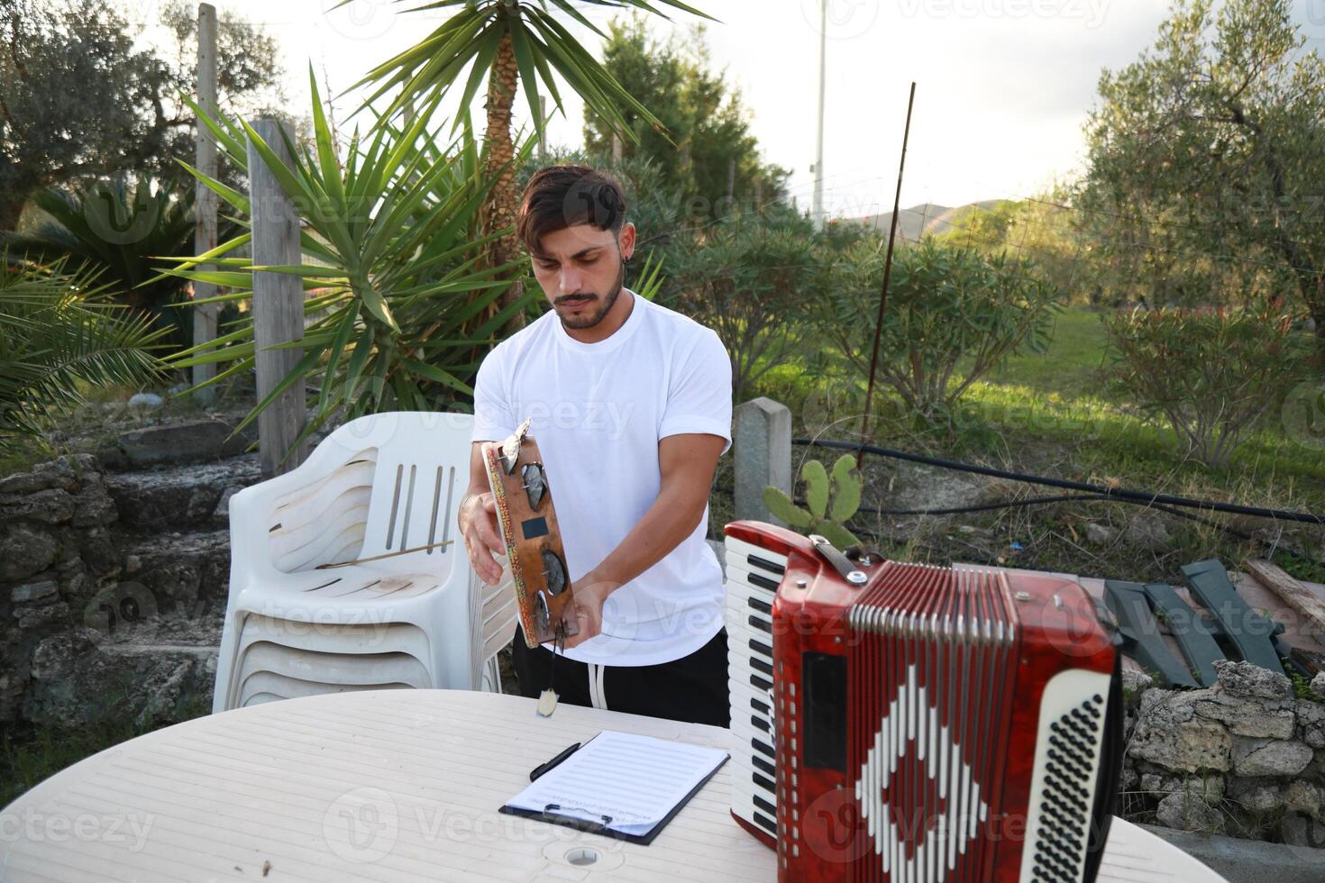 Joyful Tambourine Beats in Rolling Countryside photo