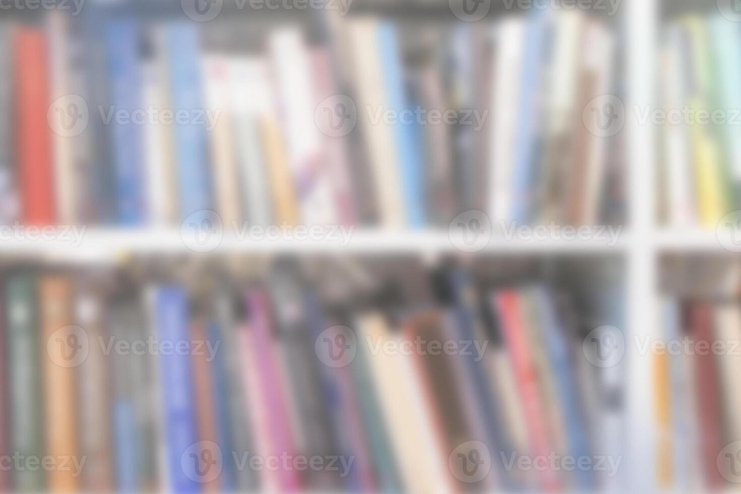 Bookshelf with books. Blurred, defocused. photo
