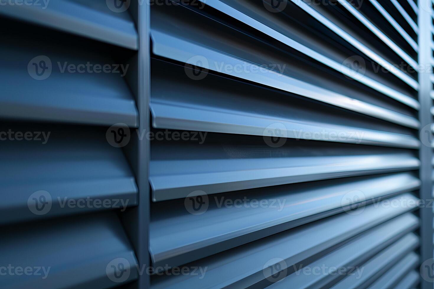 Modern building facade showing metal louvers creating textured background photo