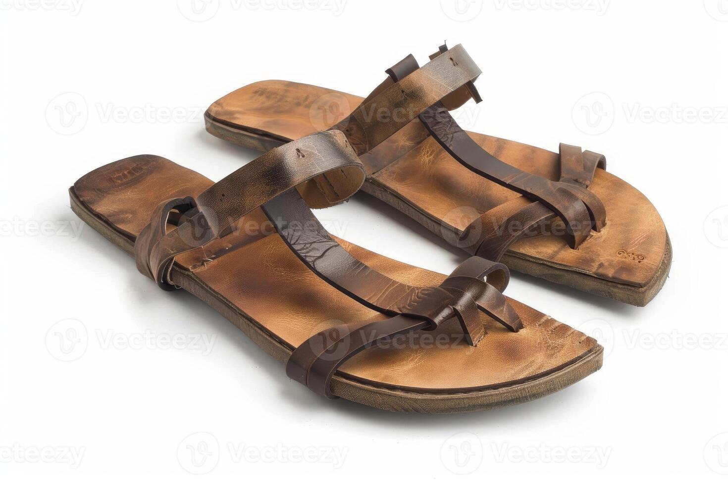 Pair of stylish brown leather summer sandals isolated on white background photo