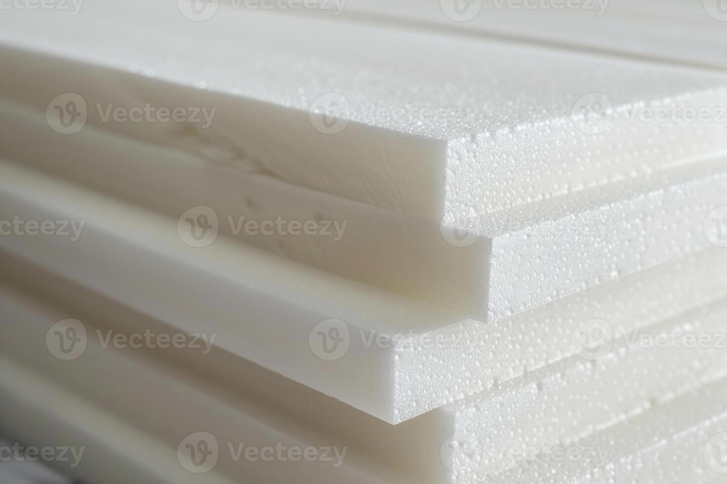 Stack of white polystyrene foam boards for construction photo