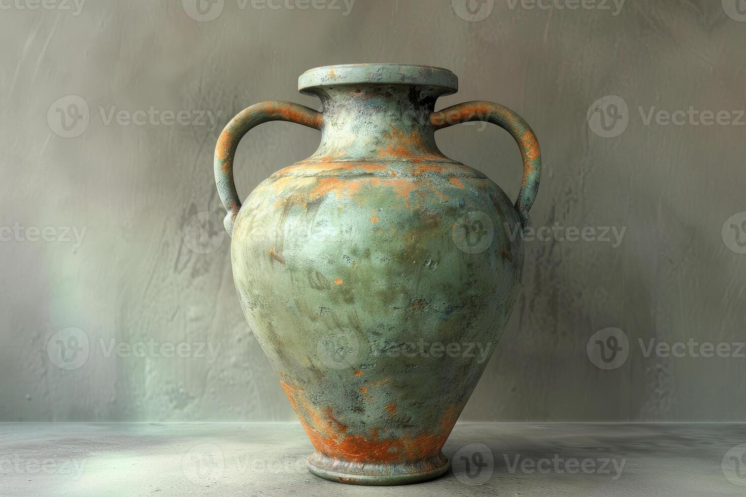 Ancient amphora standing on a stone table against a textured wall photo