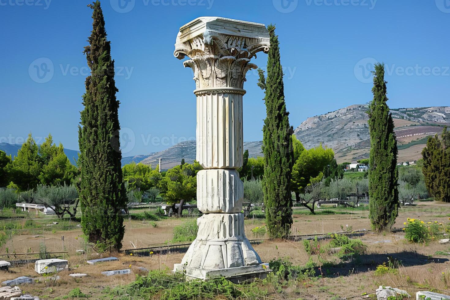 Ancient greek corinthian column standing tall in ruins photo