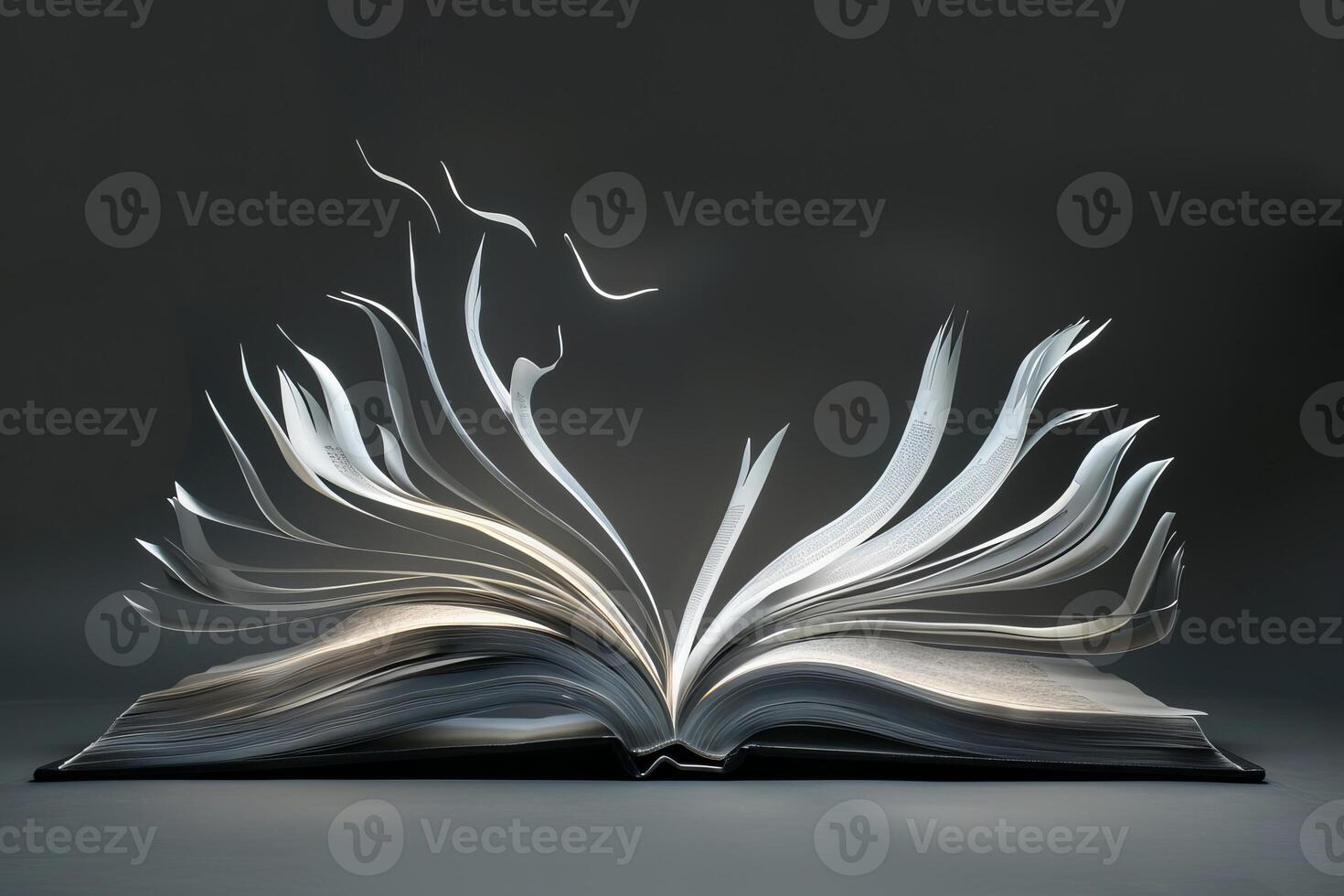Open book with pages forming an abstract shape on dark background photo
