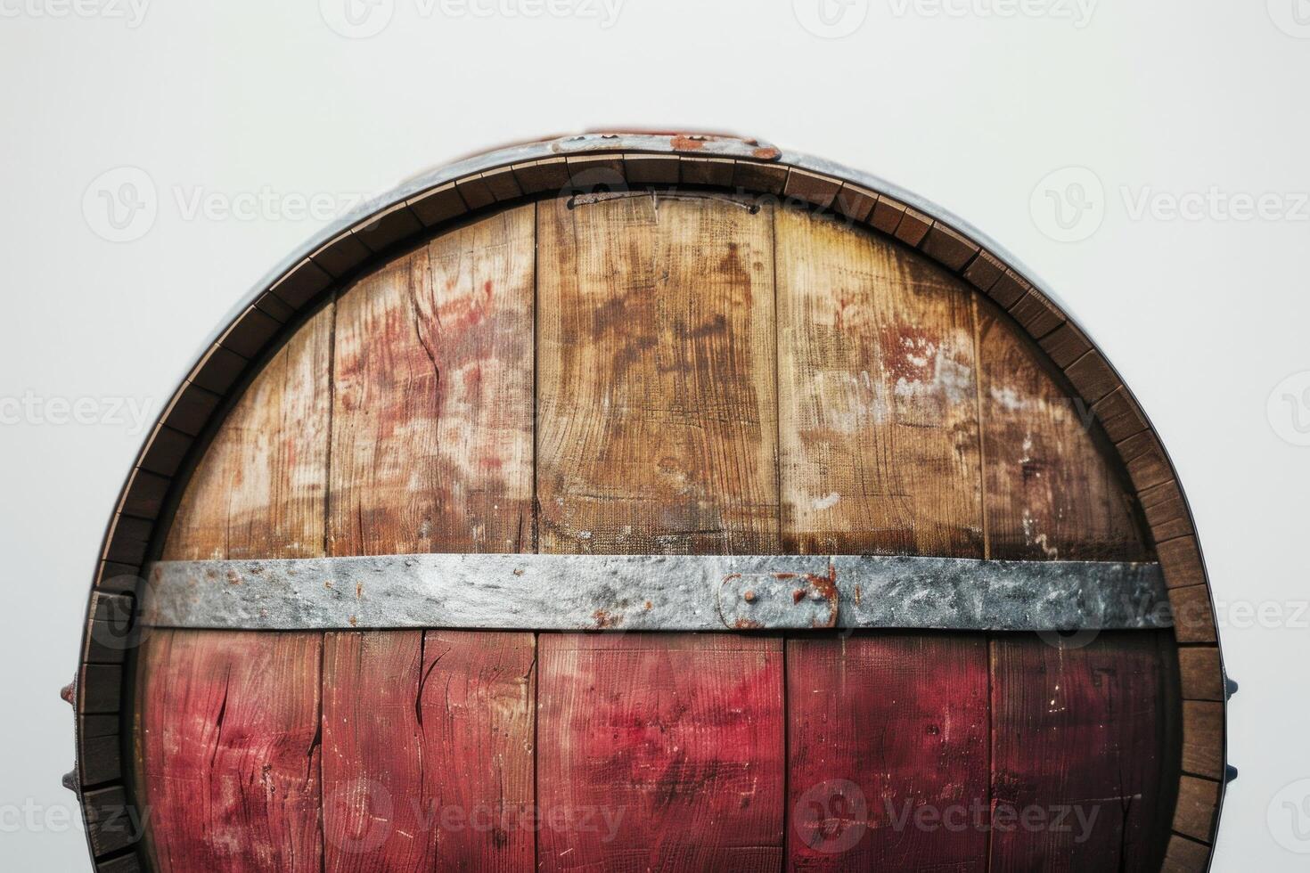 Wine barrel showing red wine stains and metal rings on white background photo