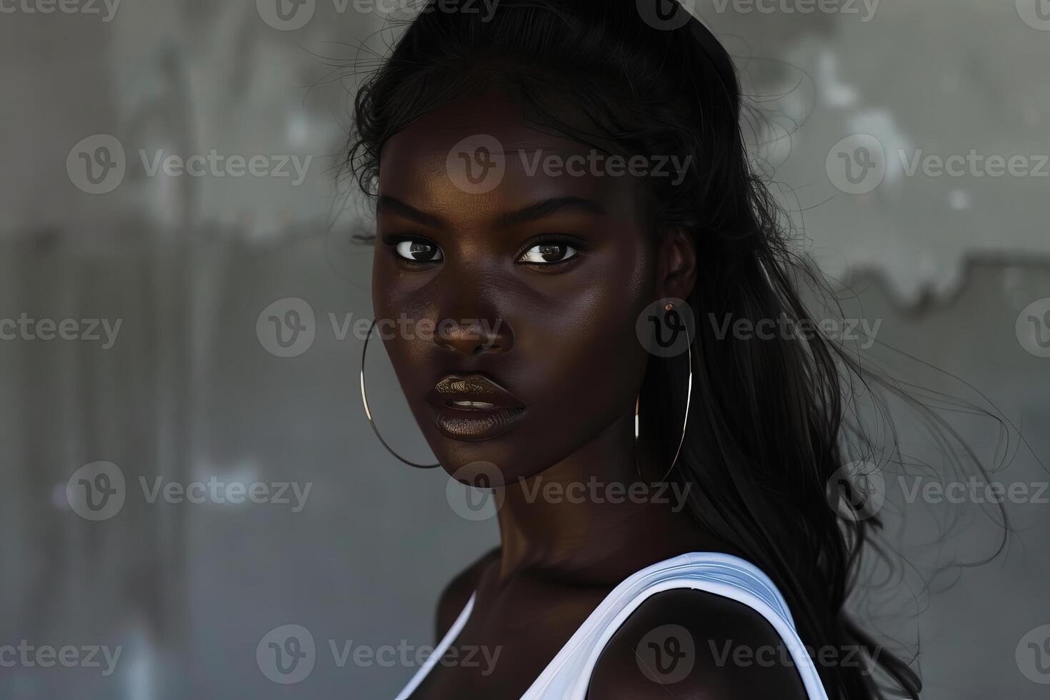 Fashion model posing with gold lipstick and hoop earrings photo
