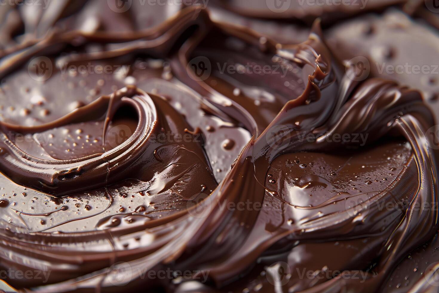 Delicious chocolate cream rotating and mixing, creating a smooth texture photo