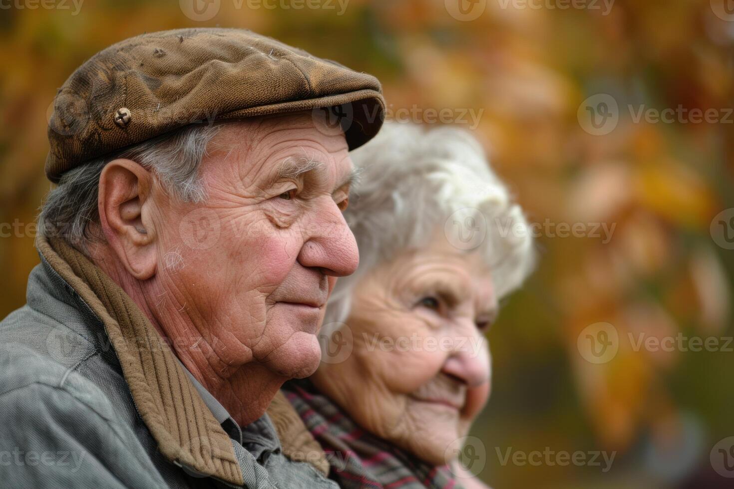 Elderly couple enjoying golden years in autumn scenery photo