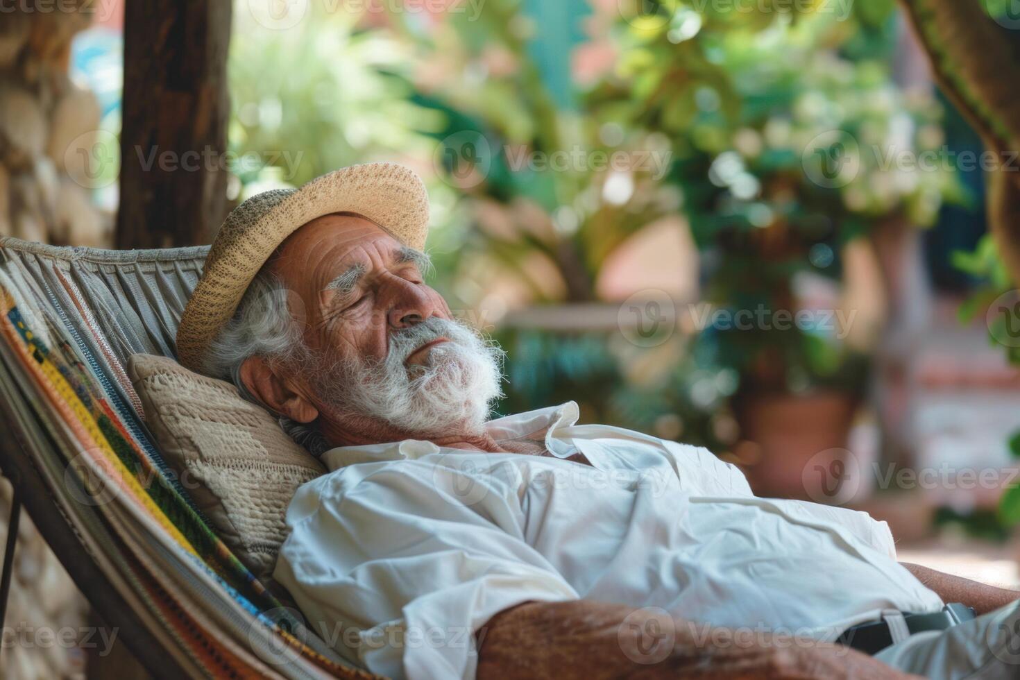 Senior farmer sleeping peacefully in hammock after workday in garden photo