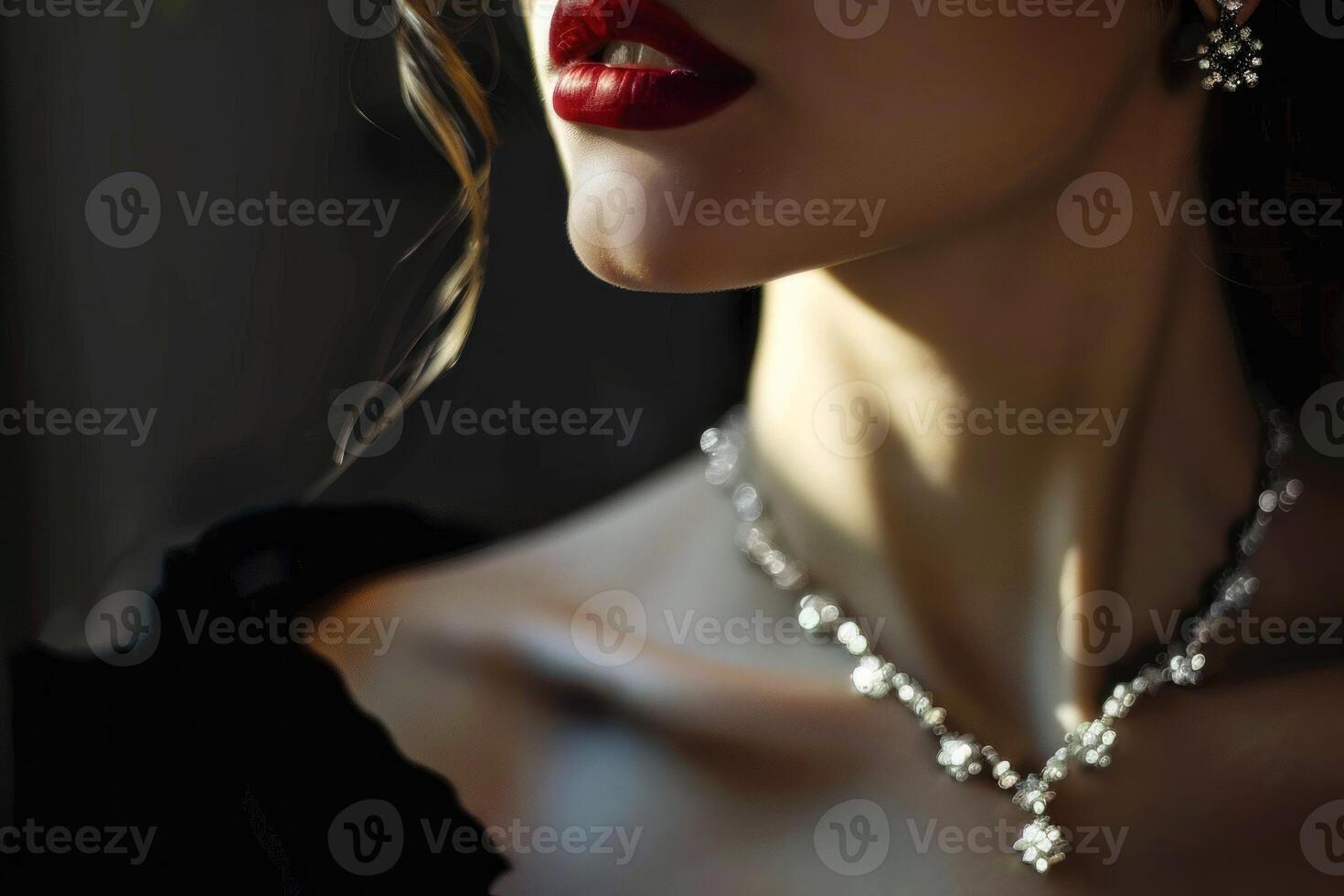Elegant woman wearing red lipstick and diamond necklace photo