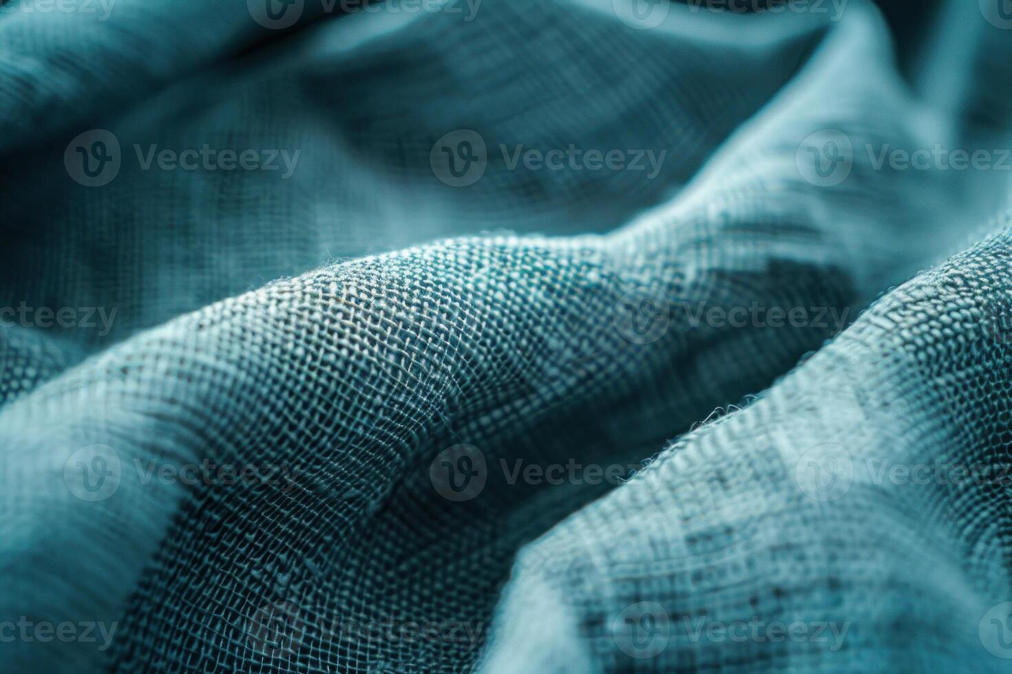 Turquoise fabric weaving showing macro texture details photo
