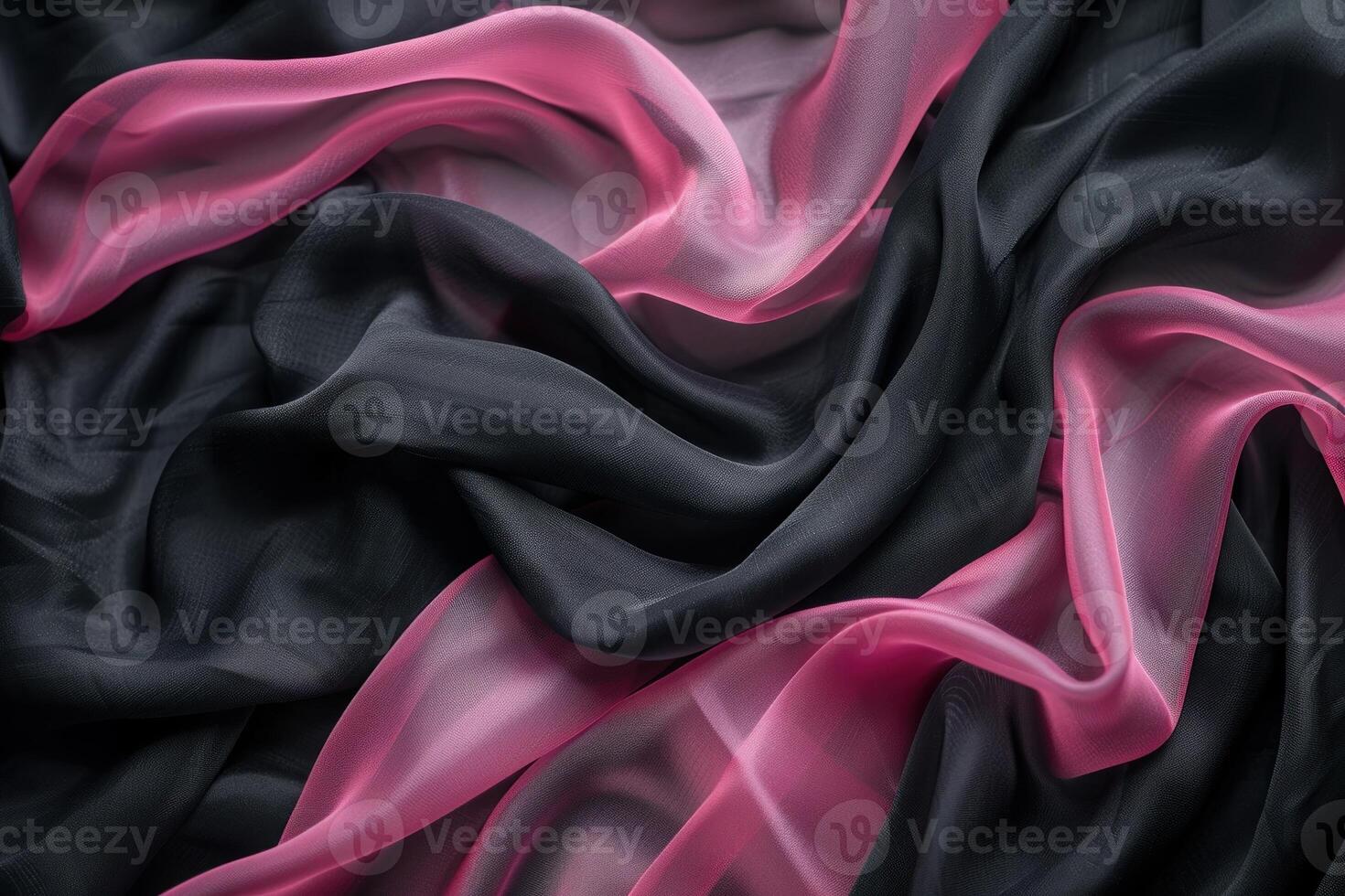 Pink and black silk fabric flowing smoothly creating elegant waves photo