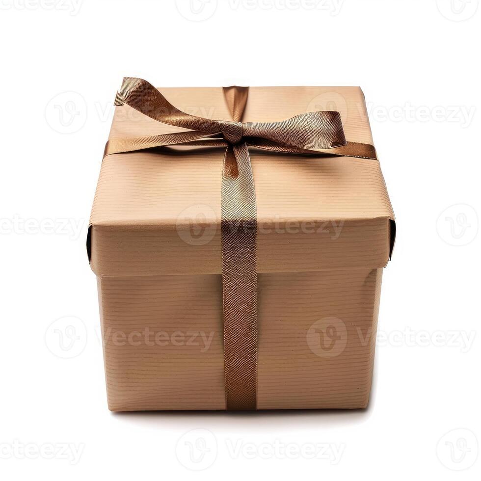 Single gift box wrapped with brown paper and tied with a brown ribbon on a white background photo