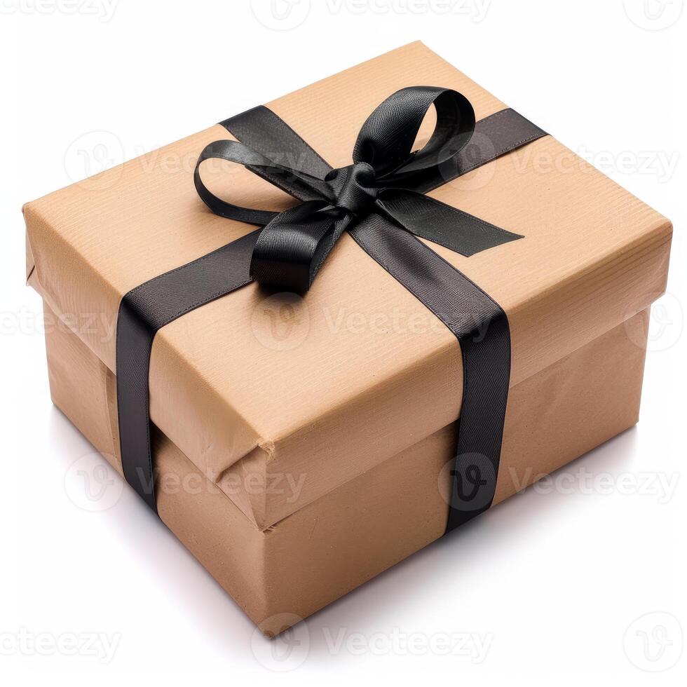Elegant gift box wrapped with a black ribbon is lying on white background photo