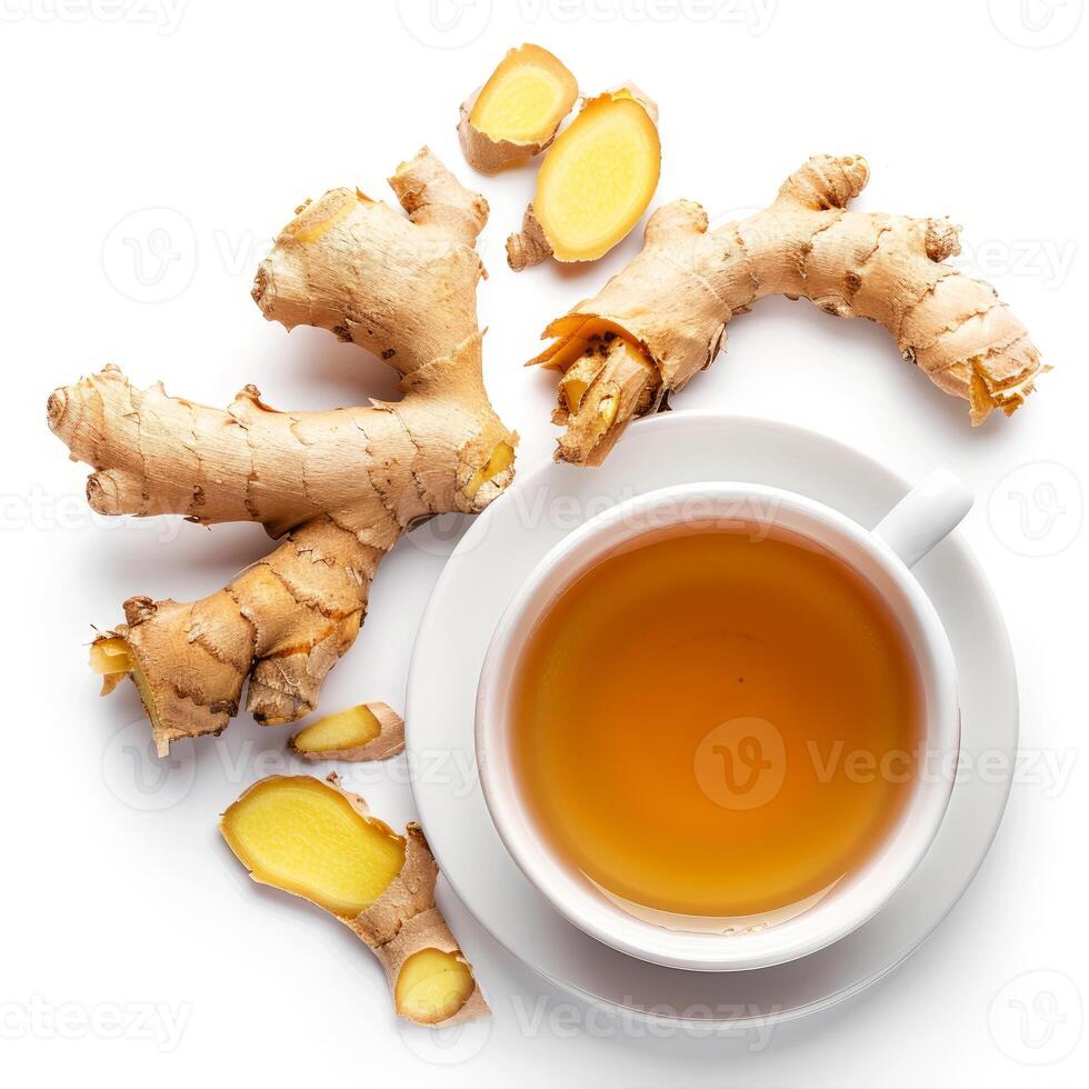 Fresh ginger root and cup of ginger tea on white background photo