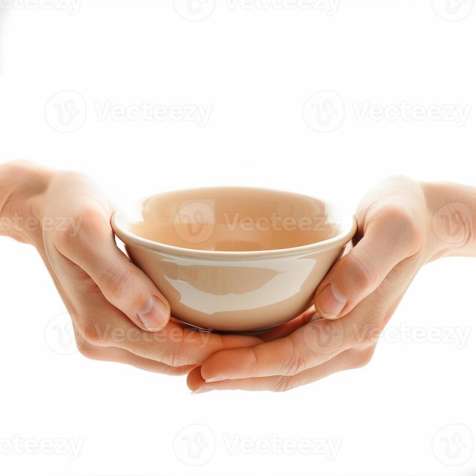 Woman hands holding empty bowl on white background photo