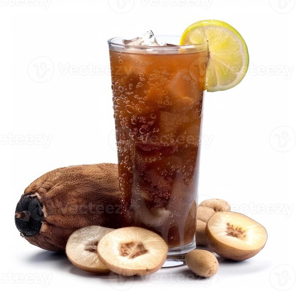 Glass of refreshing homemade juice with sapodilla fruit and ice cubes on white background photo