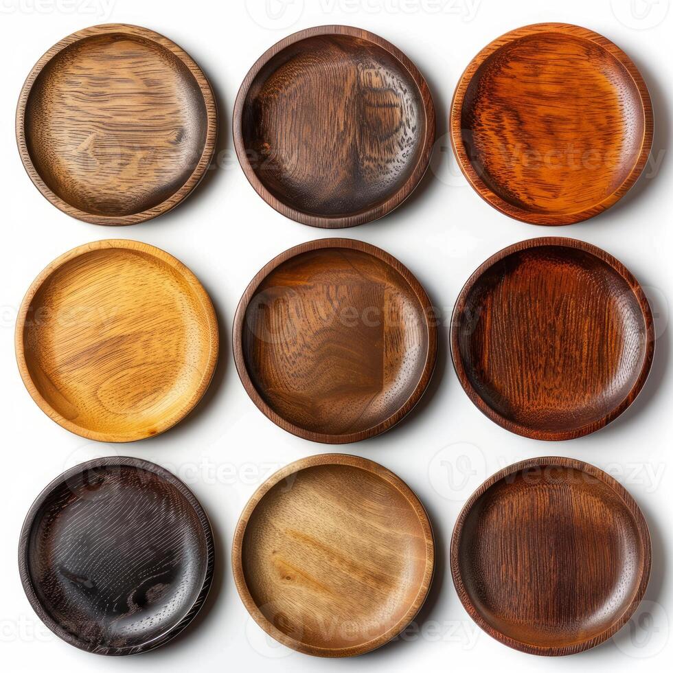 Nine empty round wooden plates forming a square shape photo